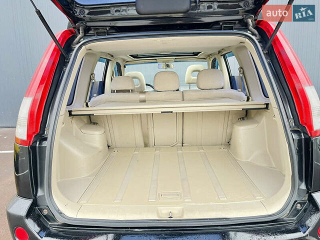 Черный Ниссан ИксТрейл, объемом двигателя 2 л и пробегом 320 тыс. км за 5600 $, фото 14 на Automoto.ua