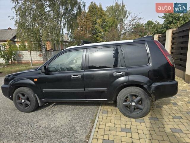 Черный Ниссан ИксТрейл, объемом двигателя 2.2 л и пробегом 300 тыс. км за 3300 $, фото 11 на Automoto.ua