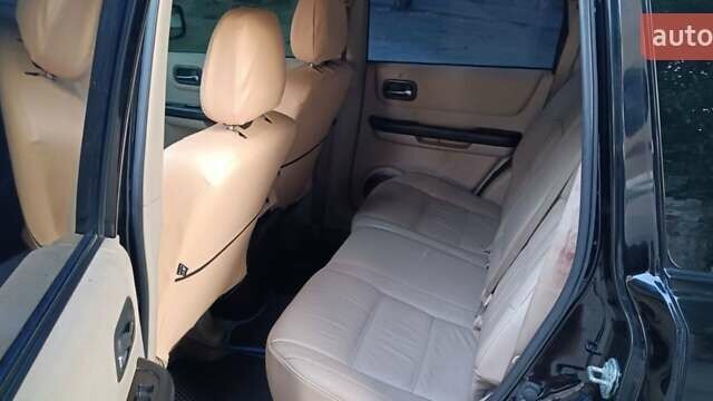 Черный Ниссан ИксТрейл, объемом двигателя 2 л и пробегом 300 тыс. км за 6300 $, фото 6 на Automoto.ua