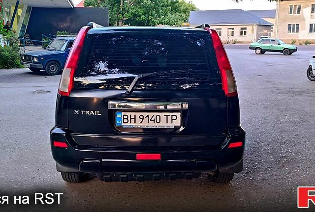 Черный Ниссан ИксТрейл, объемом двигателя 2 л и пробегом 250 тыс. км за 6300 $, фото 5 на Automoto.ua