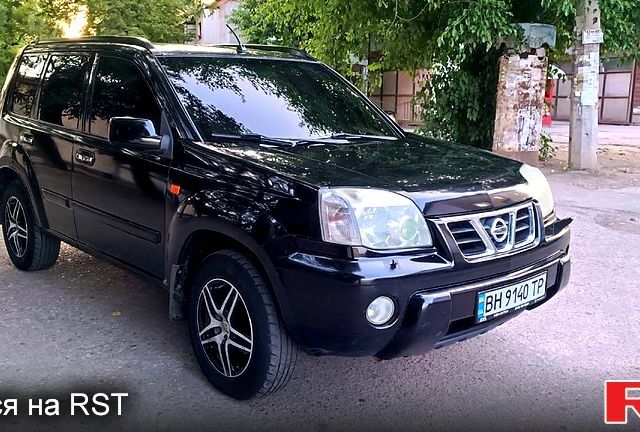 Черный Ниссан ИксТрейл, объемом двигателя 2 л и пробегом 250 тыс. км за 6300 $, фото 1 на Automoto.ua