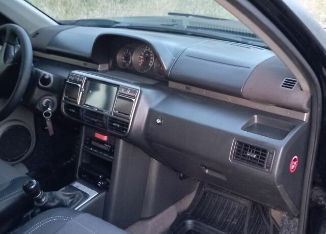 Черный Ниссан ИксТрейл, объемом двигателя 2 л и пробегом 380 тыс. км за 6500 $, фото 5 на Automoto.ua