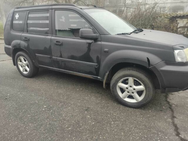 Черный Ниссан ИксТрейл, объемом двигателя 2.2 л и пробегом 220 тыс. км за 3350 $, фото 9 на Automoto.ua