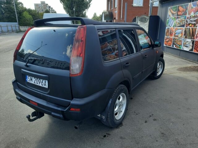 Черный Ниссан ИксТрейл, объемом двигателя 2.2 л и пробегом 280 тыс. км за 3000 $, фото 2 на Automoto.ua