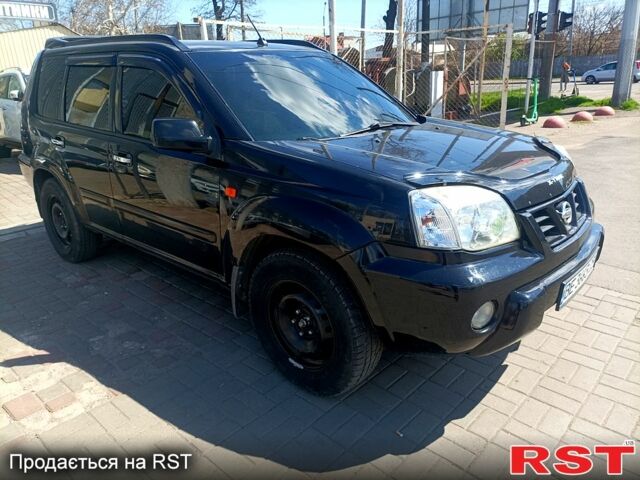 Черный Ниссан ИксТрейл, объемом двигателя 2.2 л и пробегом 333 тыс. км за 6500 $, фото 2 на Automoto.ua