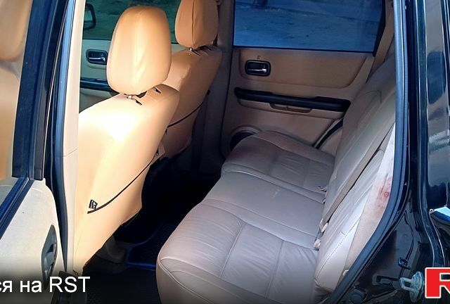 Черный Ниссан ИксТрейл, объемом двигателя 2 л и пробегом 250 тыс. км за 6300 $, фото 8 на Automoto.ua