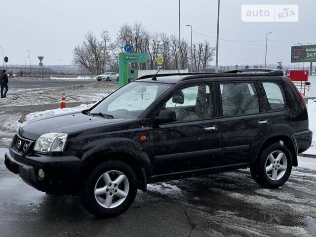 Чорний Ніссан ІксТрейл, об'ємом двигуна 2.2 л та пробігом 261 тис. км за 5200 $, фото 2 на Automoto.ua