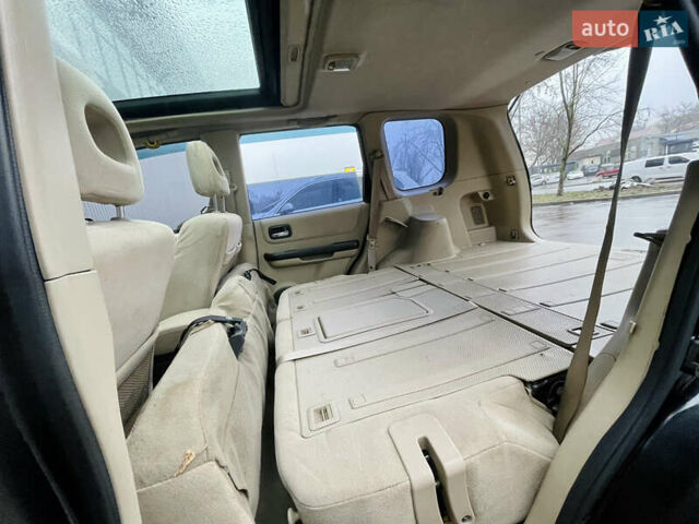 Черный Ниссан ИксТрейл, объемом двигателя 2 л и пробегом 320 тыс. км за 5600 $, фото 16 на Automoto.ua