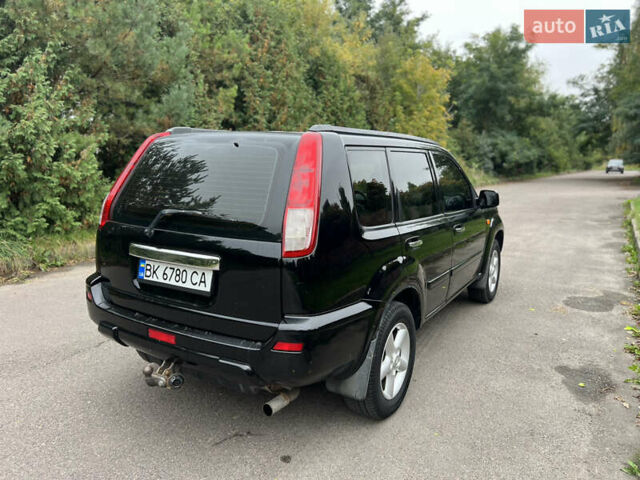 Черный Ниссан ИксТрейл, объемом двигателя 2 л и пробегом 260 тыс. км за 5300 $, фото 21 на Automoto.ua
