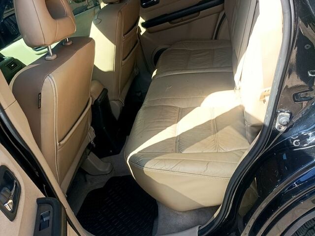 Черный Ниссан ИксТрейл, объемом двигателя 2.2 л и пробегом 333 тыс. км за 6500 $, фото 10 на Automoto.ua