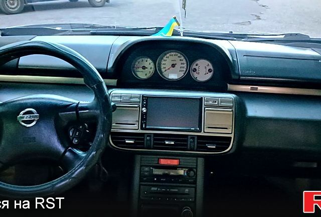 Черный Ниссан ИксТрейл, объемом двигателя 2 л и пробегом 257 тыс. км за 5800 $, фото 12 на Automoto.ua