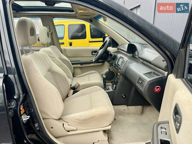 Черный Ниссан ИксТрейл, объемом двигателя 2 л и пробегом 320 тыс. км за 5600 $, фото 5 на Automoto.ua