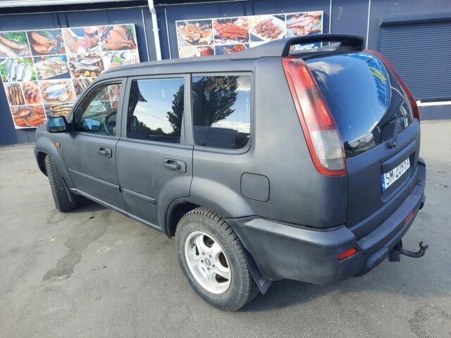 Черный Ниссан ИксТрейл, объемом двигателя 2.2 л и пробегом 280 тыс. км за 3000 $, фото 3 на Automoto.ua