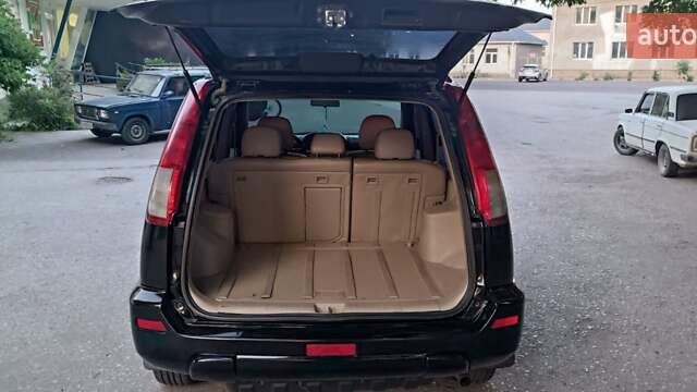 Черный Ниссан ИксТрейл, объемом двигателя 2 л и пробегом 300 тыс. км за 6300 $, фото 13 на Automoto.ua