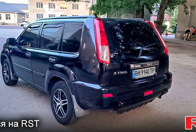 Черный Ниссан ИксТрейл, объемом двигателя 2 л и пробегом 257 тыс. км за 5800 $, фото 6 на Automoto.ua