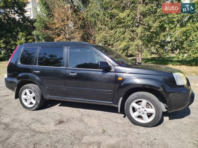 Черный Ниссан ИксТрейл, объемом двигателя 2 л и пробегом 227 тыс. км за 5200 $, фото 9 на Automoto.ua