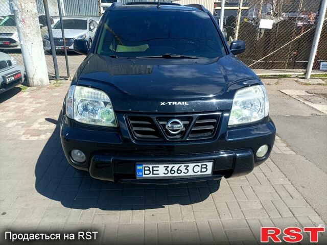 Черный Ниссан ИксТрейл, объемом двигателя 2.2 л и пробегом 333 тыс. км за 6500 $, фото 1 на Automoto.ua