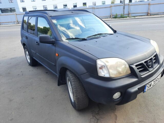 Черный Ниссан ИксТрейл, объемом двигателя 2.2 л и пробегом 280 тыс. км за 3000 $, фото 1 на Automoto.ua