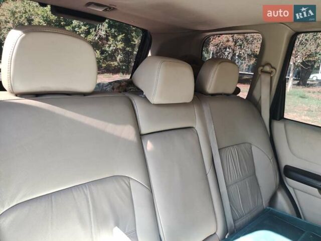 Черный Ниссан ИксТрейл, объемом двигателя 2 л и пробегом 227 тыс. км за 5200 $, фото 6 на Automoto.ua