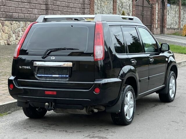 Чорний Ніссан ІксТрейл, об'ємом двигуна 2.5 л та пробігом 231 тис. км за 3630 $, фото 6 на Automoto.ua