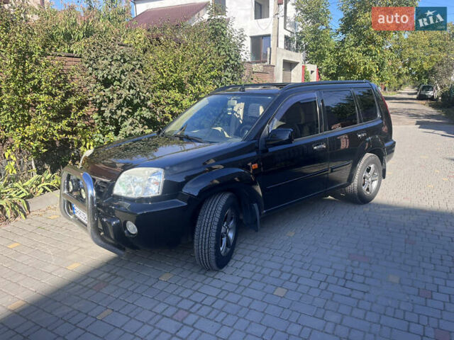 Черный Ниссан ИксТрейл, объемом двигателя 2.49 л и пробегом 176 тыс. км за 7800 $, фото 1 на Automoto.ua