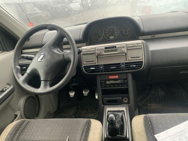 Черный Ниссан ИксТрейл, объемом двигателя 2.2 л и пробегом 370 тыс. км за 2950 $, фото 6 на Automoto.ua