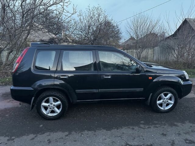 Черный Ниссан ИксТрейл, объемом двигателя 0 л и пробегом 420 тыс. км за 2010 $, фото 7 на Automoto.ua