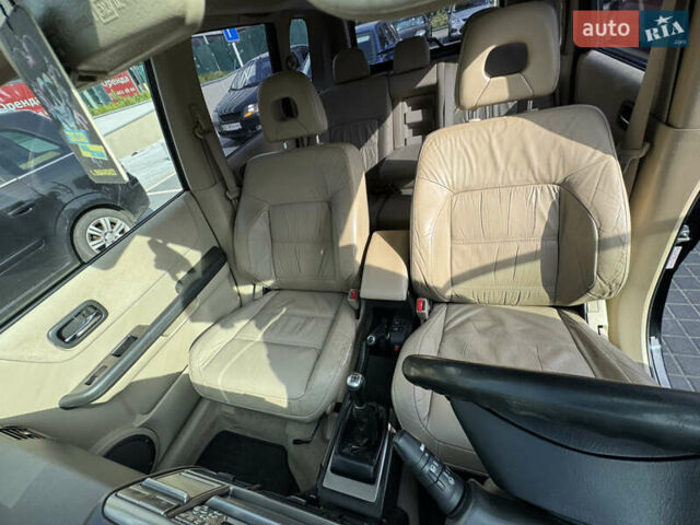 Черный Ниссан ИксТрейл, объемом двигателя 2.5 л и пробегом 318 тыс. км за 8000 $, фото 17 на Automoto.ua