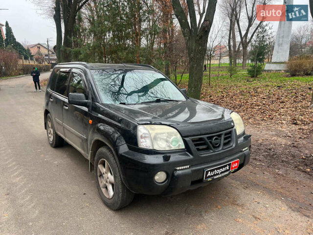 Черный Ниссан ИксТрейл, объемом двигателя 2 л и пробегом 215 тыс. км за 6490 $, фото 2 на Automoto.ua