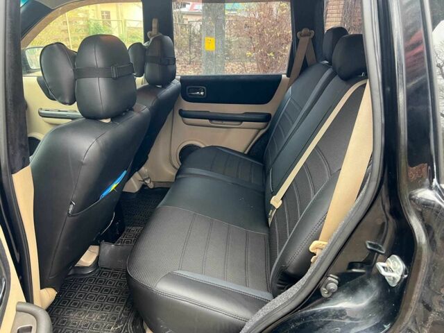 Черный Ниссан ИксТрейл, объемом двигателя 2 л и пробегом 215 тыс. км за 6490 $, фото 16 на Automoto.ua