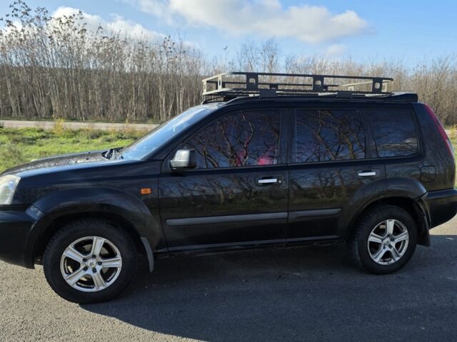 Черный Ниссан ИксТрейл, объемом двигателя 2 л и пробегом 365 тыс. км за 4023 $, фото 6 на Automoto.ua