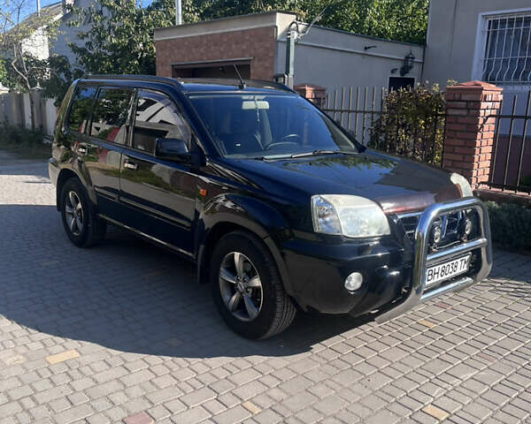 Черный Ниссан ИксТрейл, объемом двигателя 2.49 л и пробегом 176 тыс. км за 7800 $, фото 16 на Automoto.ua