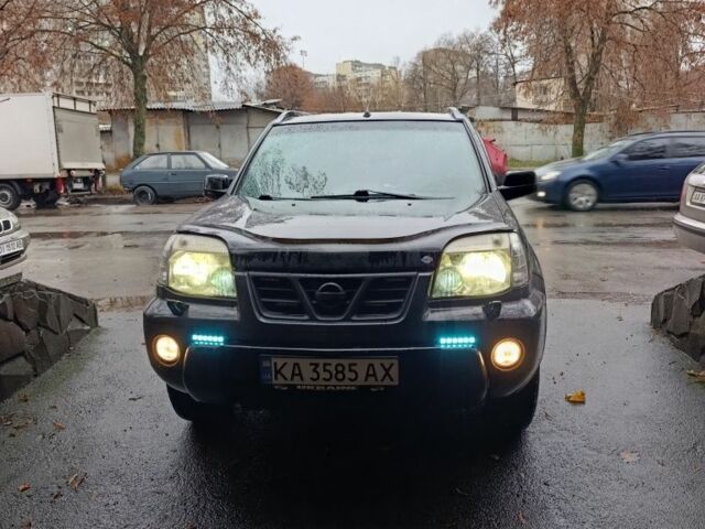 Чорний Ніссан ІксТрейл, об'ємом двигуна 2 л та пробігом 213 тис. км за 7538 $, фото 1 на Automoto.ua