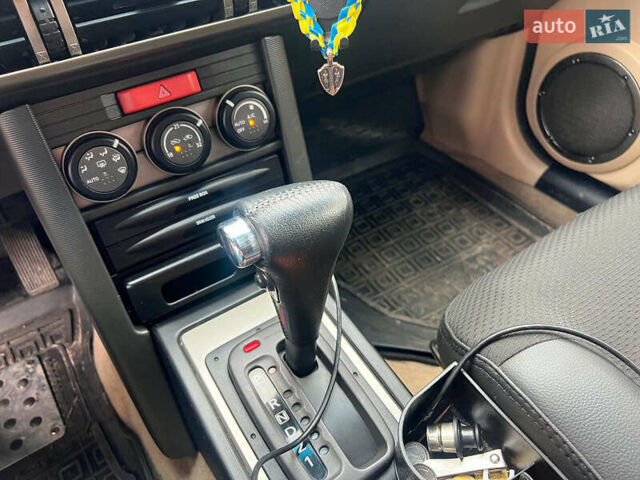 Черный Ниссан ИксТрейл, объемом двигателя 2 л и пробегом 215 тыс. км за 6490 $, фото 13 на Automoto.ua