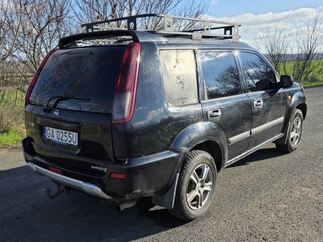 Черный Ниссан ИксТрейл, объемом двигателя 2 л и пробегом 365 тыс. км за 4023 $, фото 5 на Automoto.ua