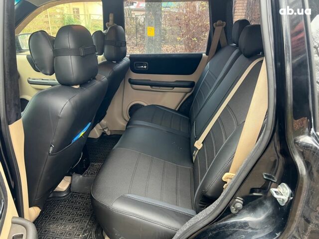 Чорний Ніссан ІксТрейл, об'ємом двигуна 2 л та пробігом 215 тис. км за 6490 $, фото 16 на Automoto.ua