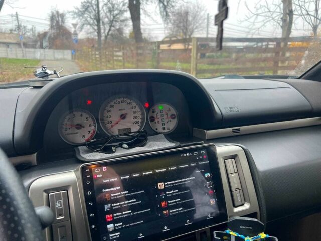 Черный Ниссан ИксТрейл, объемом двигателя 2 л и пробегом 215 тыс. км за 6490 $, фото 12 на Automoto.ua