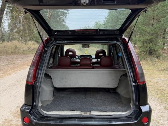 Черный Ниссан ИксТрейл, объемом двигателя 2.2 л и пробегом 225 тыс. км за 3800 $, фото 13 на Automoto.ua