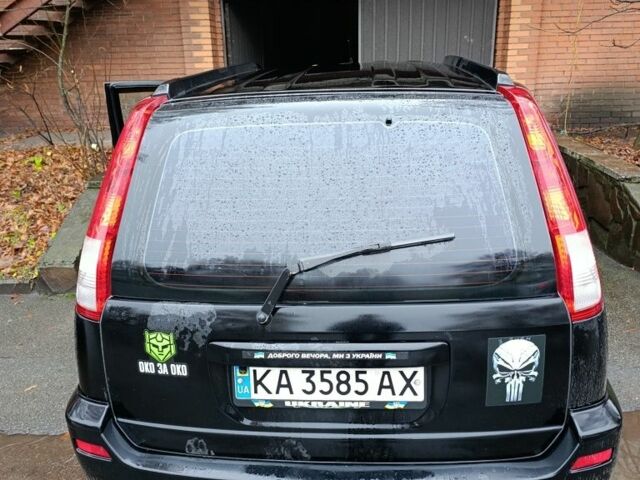 Чорний Ніссан ІксТрейл, об'ємом двигуна 2 л та пробігом 213 тис. км за 7538 $, фото 5 на Automoto.ua