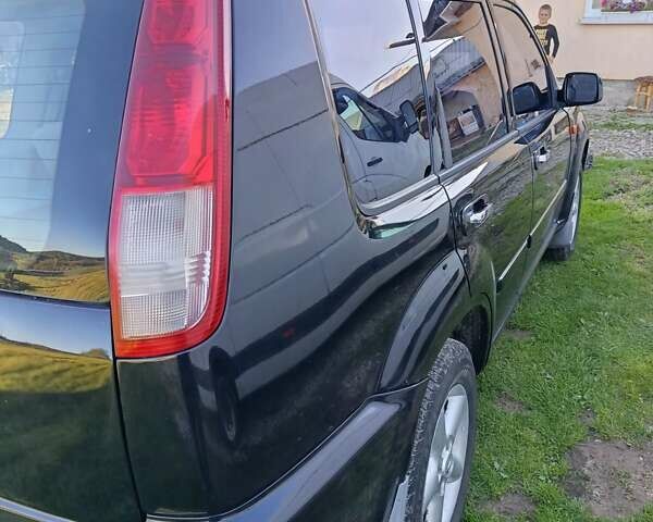 Черный Ниссан ИксТрейл, объемом двигателя 2 л и пробегом 276 тыс. км за 6000 $, фото 7 на Automoto.ua