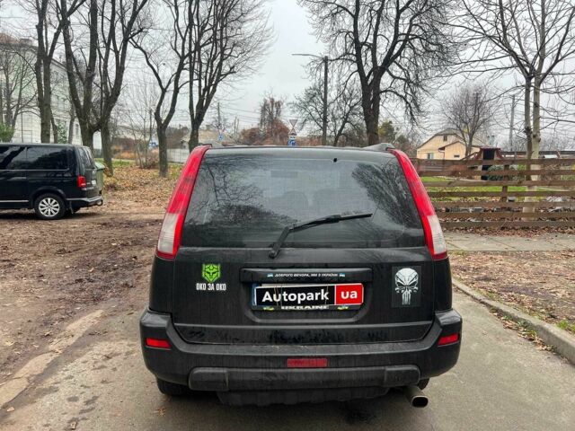 Черный Ниссан ИксТрейл, объемом двигателя 2 л и пробегом 215 тыс. км за 6490 $, фото 5 на Automoto.ua