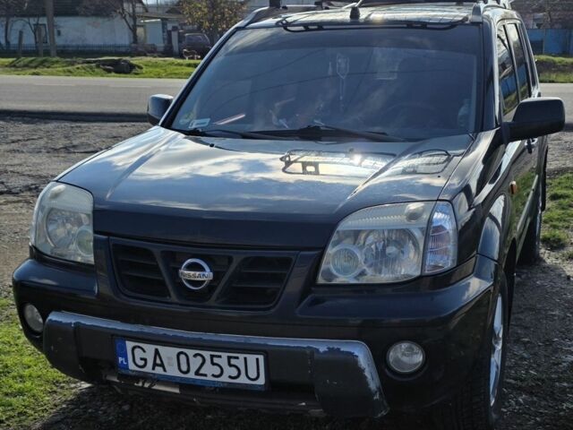 Черный Ниссан ИксТрейл, объемом двигателя 2 л и пробегом 365 тыс. км за 4013 $, фото 10 на Automoto.ua