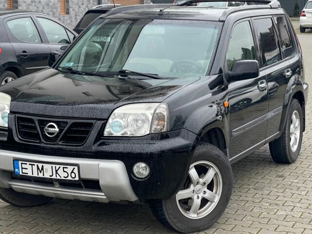 Черный Ниссан ИксТрейл, объемом двигателя 2.2 л и пробегом 290 тыс. км за 3841 $, фото 1 на Automoto.ua