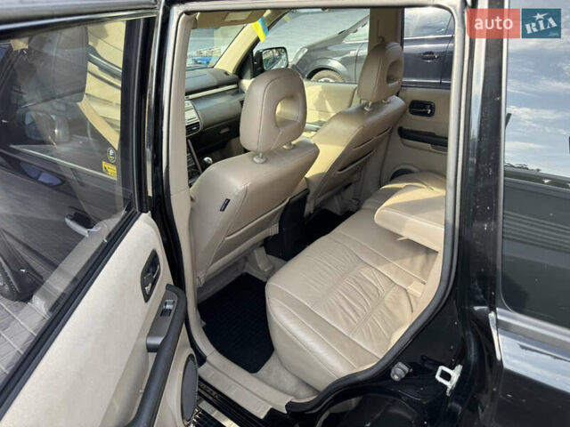 Черный Ниссан ИксТрейл, объемом двигателя 2.5 л и пробегом 318 тыс. км за 8000 $, фото 9 на Automoto.ua