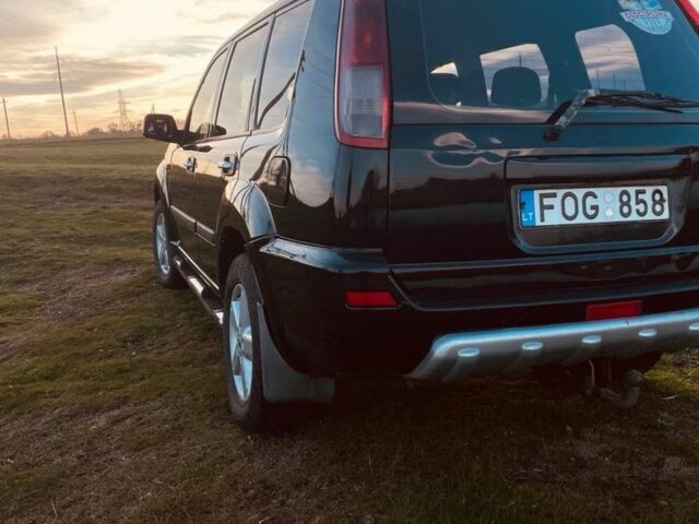 Черный Ниссан ИксТрейл, объемом двигателя 2.2 л и пробегом 400 тыс. км за 3222 $, фото 1 на Automoto.ua