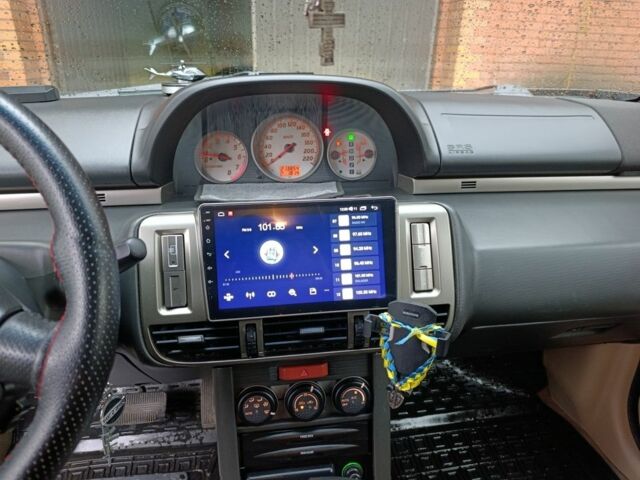 Чорний Ніссан ІксТрейл, об'ємом двигуна 2 л та пробігом 213 тис. км за 7538 $, фото 2 на Automoto.ua