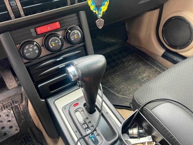 Черный Ниссан ИксТрейл, объемом двигателя 2 л и пробегом 215 тыс. км за 6490 $, фото 13 на Automoto.ua