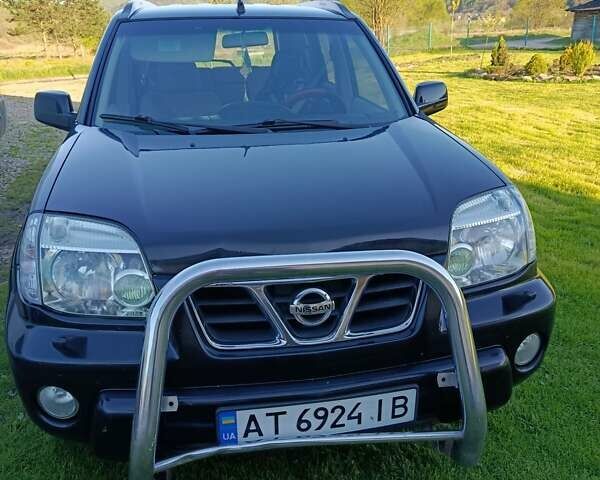 Черный Ниссан ИксТрейл, объемом двигателя 2 л и пробегом 276 тыс. км за 6000 $, фото 4 на Automoto.ua