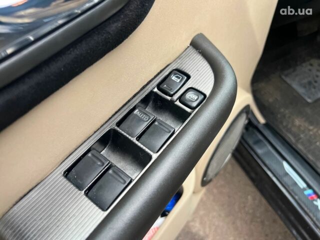 Чорний Ніссан ІксТрейл, об'ємом двигуна 2 л та пробігом 215 тис. км за 6490 $, фото 10 на Automoto.ua