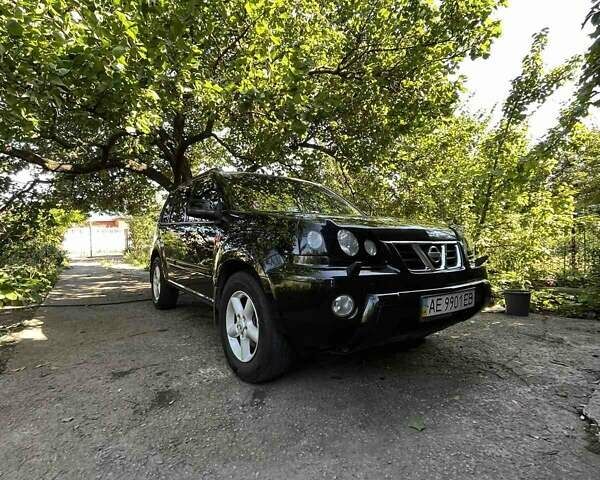 Черный Ниссан ИксТрейл, объемом двигателя 2.5 л и пробегом 287 тыс. км за 7700 $, фото 2 на Automoto.ua